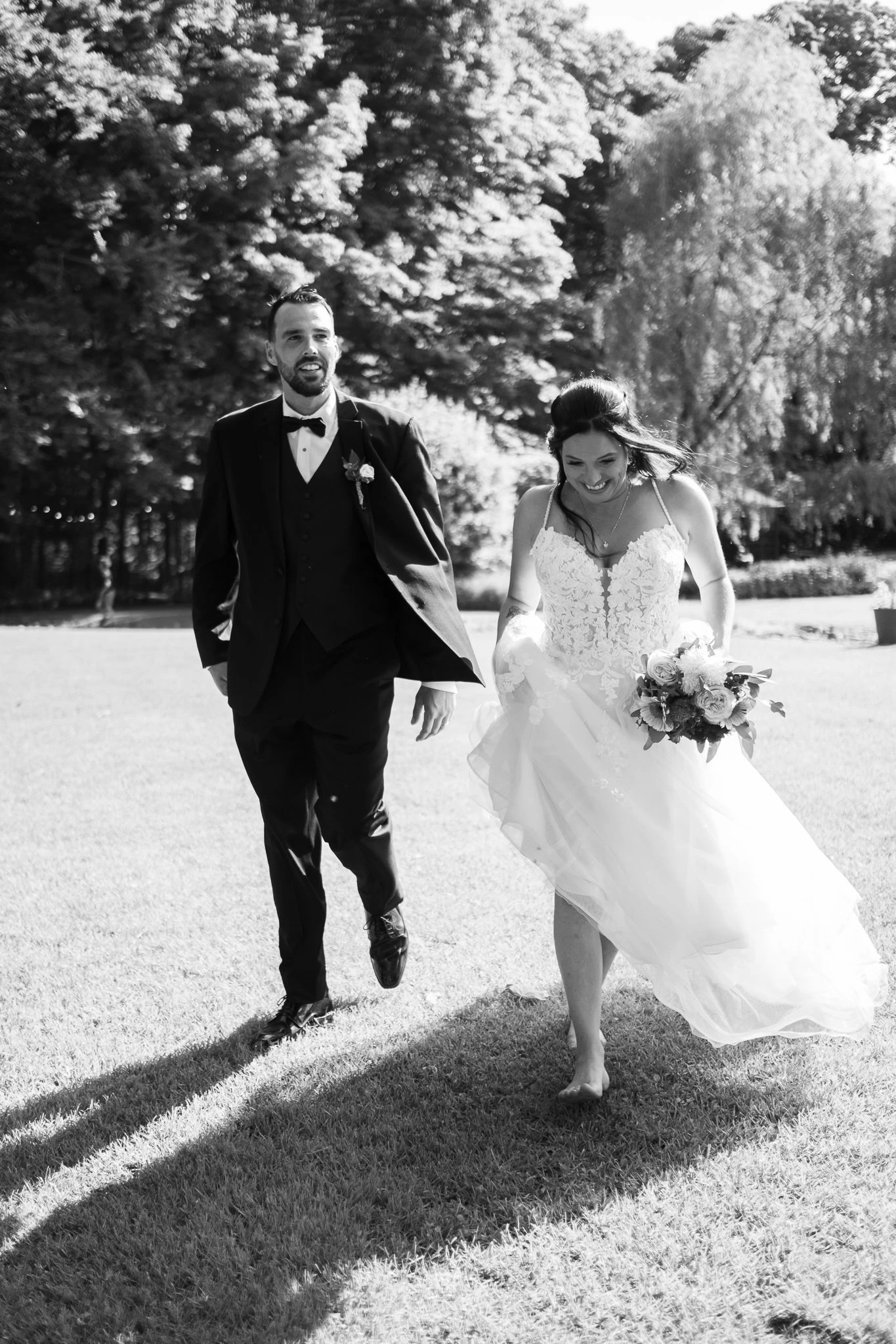 The newlyweds open champagne in the middle of a lively reception